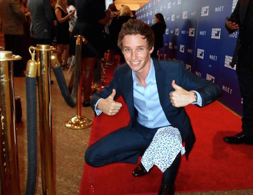 Eddie Redmayne poses for Pablove Shutterbug Jacob.