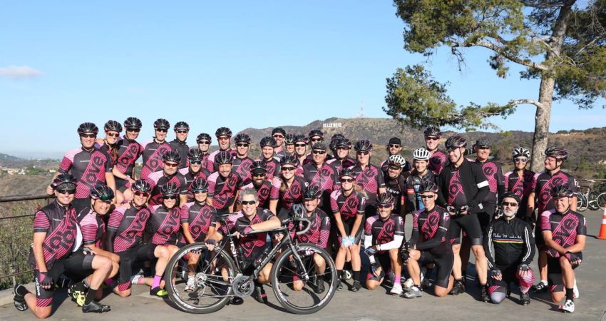 Cyclists in font of Hollywood Sign - Childhood Cancer Fundraiser - Peloton